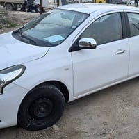 نيسان سني هندي 2020 رقم اربيل صبغ قطعة والباقي مقفول مواصفات شاشة وكام...