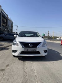 نيسان سني هندي 2024 ماشية ٣٠ رقم بغداد السيارة مكفولة من الصبغ والتبدي...