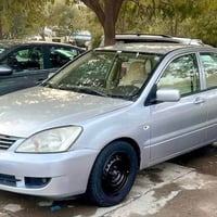 لانسر ٢٠١١ • محرك قوي • رقم جديد ٢٠٣٠