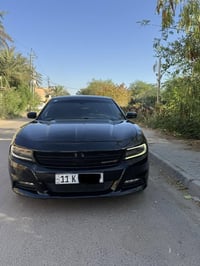 دوج جارجر موديل 2018 SXT مكفولة من الصبغ بيها مكانات بارد شي قليل  تبر...