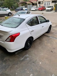 للبيع نيسان سني  هندي موديل ٢٠٢٠ بغداد رقم الانكليزي بسمي ماشية ١٢٥ بي...