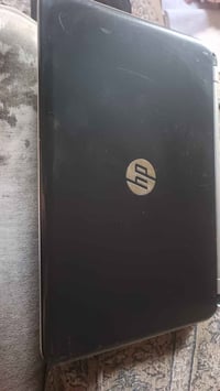 لابتوب HP • شاحن وجنطة • البصرة