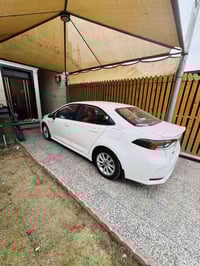 كورلا هايبرد موديل25 ماشيه 13 الف ماخذه زيرو ع ايدي كفاله عامه كرسي كه...