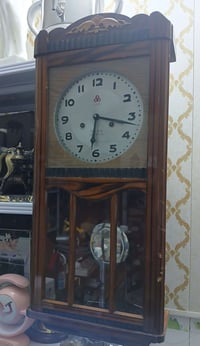 ساعة جدارية • خشب • شغّال