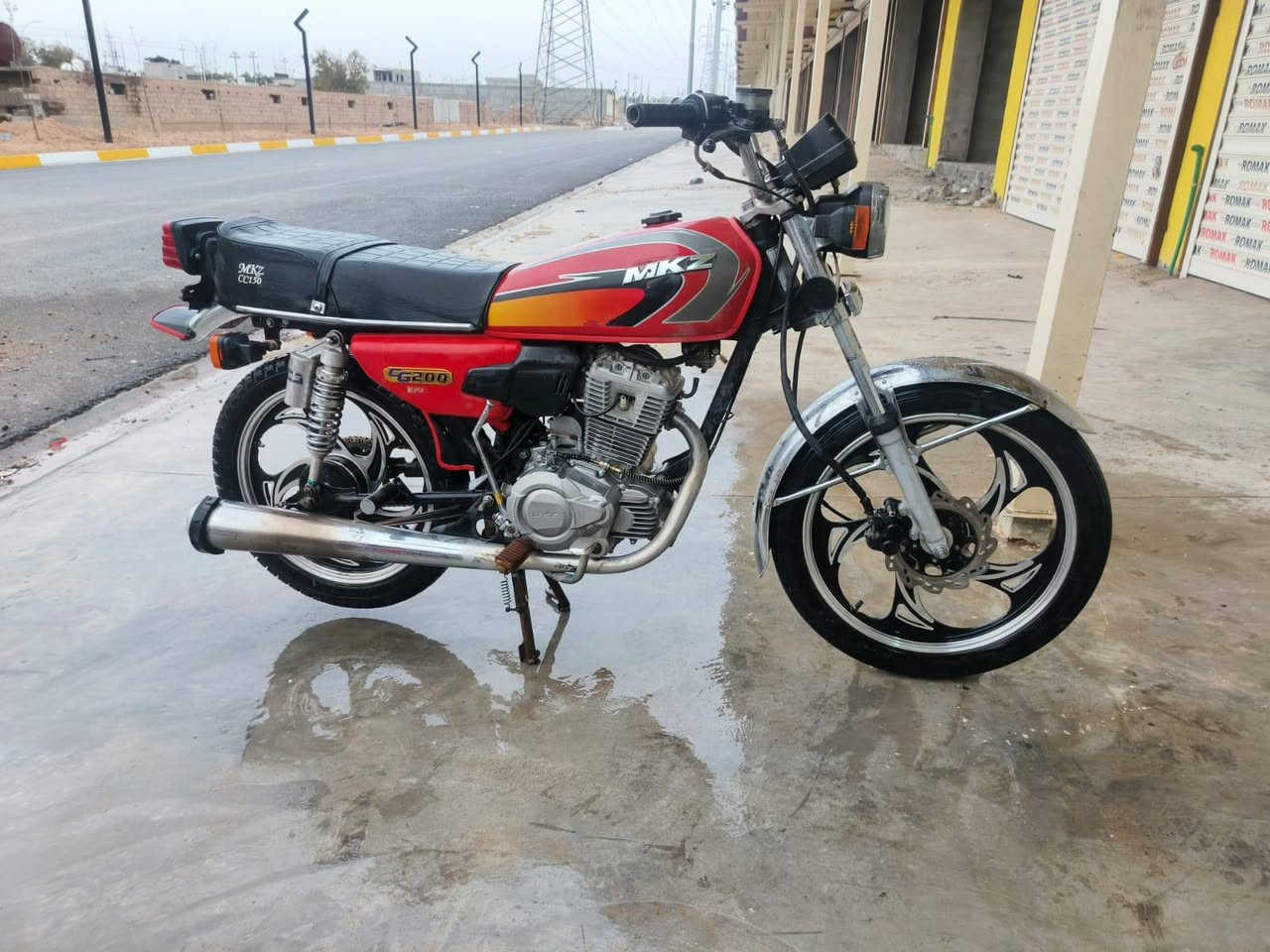 سلام عليكم بيع او مراوس  دراجه مكز متين محرك وحشي200يجي ضاغطع وزنجير موديل 1997مسجله2021دراجه خير من الله صوط ناعم سلف كهربأياته كله شغاله عنوان خانقين رقم ***********
