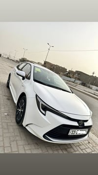 كورلا هايبرد ( 2025 )  محرك 1800 ماشية 8 الف كم فقط مغلف جام عازل حرار...