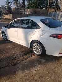 كورولا هايبرد  موديل 25 سياره جديده محرك 1800 سياره كفاله عامه زيرو مط...