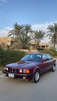 Bmw735 سياره موديل ٩١ لون احمر ماروني دم الغزال رقم بغداد  الانكليزي ب...