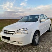 اوپترا ٢٠١١ • أبيض • تايرات جديدة