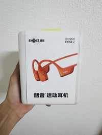 شوكز OpenRun Pro ٢ • توصيل عظمي • برتقالي
