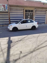 اكسنت 2009 امريكي 1600غاز بانزين كير محرك تبريد مكفول سياره حلوه وناصب...