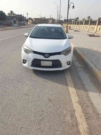 للبيع كورلا موديل 2016  Le الضرر نص البنيد فقط رقم بغداد السعر 125 وبي...