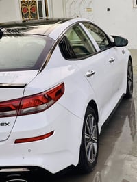 كيا اوبتما موديل 19امريكي فول مواصفات 1/1قياده ذاتية حساسات جانبيه خلف...