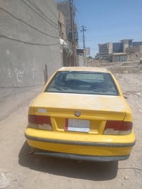 سياره سمند للبيع ب١٢ ورقه وبيها مجال 07710976592