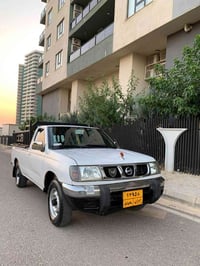 نيسان بيكاب • ٢٠٠٢ • تاير جديد