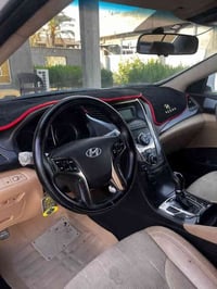 ازيرا 2014 خليجي  محرك 3.0  صبغ جاملغ خلفي   باقي السياره مكفوله   كير...