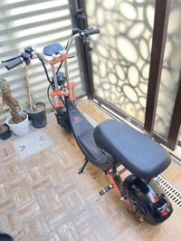 سكوتر هارلي شحن  صناعة روسية (كاجو كوين )بطارية ليثيوم 48 فولت 20 أمبي...