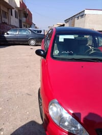 كيا ريو 2002 توماتيك شرطالتحويل مصبوغة عام بدون دواخل جمالية رقم الاله...