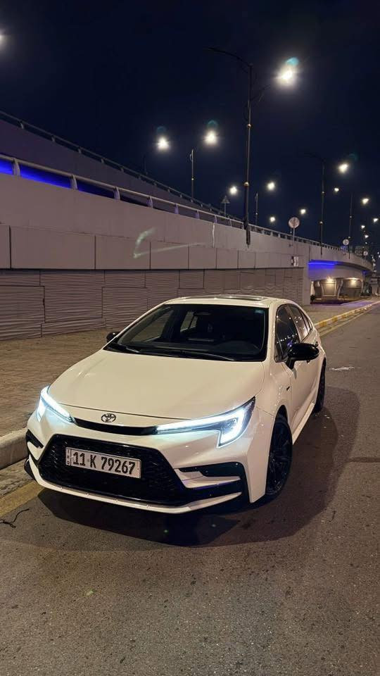 السلام عليكم  الميعرف بسعر ال S لايحجي  ولايكسر بلسعر.   كورلا هايبرد 2025 فئه S بلاك ادشن الفول
ماشية 12 الف كيلو مكفولة من كلشي ماعدا 

بلجنطة بيها بارد اقل الاصبعين 

رقم بغداد الجديد تحويل مباشر

مكان السيارة : بغداد الكاظمية

تواصل :‬ رقم التلفون

***********

***********

السعر  : 134$

سيارة بعدها بوضع شركة

كاعيات بعدها بالجيس 

مواصفات ال S معروفة

داخل اسود + محرك 1800 هايبرد HEV 

سياره كت كامل بلاك ادشن بلادي داخل مطعم بكاربون فايبر 

بصمة دخول بصمة ابواب بصمة تشغيل 

ويل كب اسود حجم 17 اسود  

شاشة جبيرة تدعم ابل كار بلي 

 سلايد روف ( فتحة سقف ) دشبول دجتل كامل سايد بريك بصمة اوتو هولد درايف مود  وضعيات قيادة ويل جبير حجم … وبعد اهواي مواصفات 

ااسيارة نضيفة كلش واتسعمال فقط للدوام
