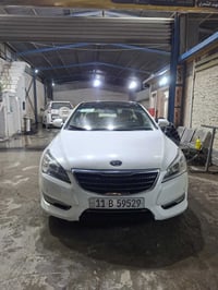 لبيع كيا كادنزا 2011فول مواصفات بيها قطعتين صبغ السعر 100ورقه وبيها مج...