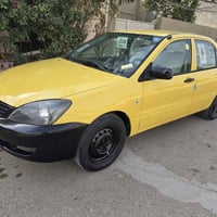 لانسر • ٢٠٠٩ • رقم بغداد الدولي