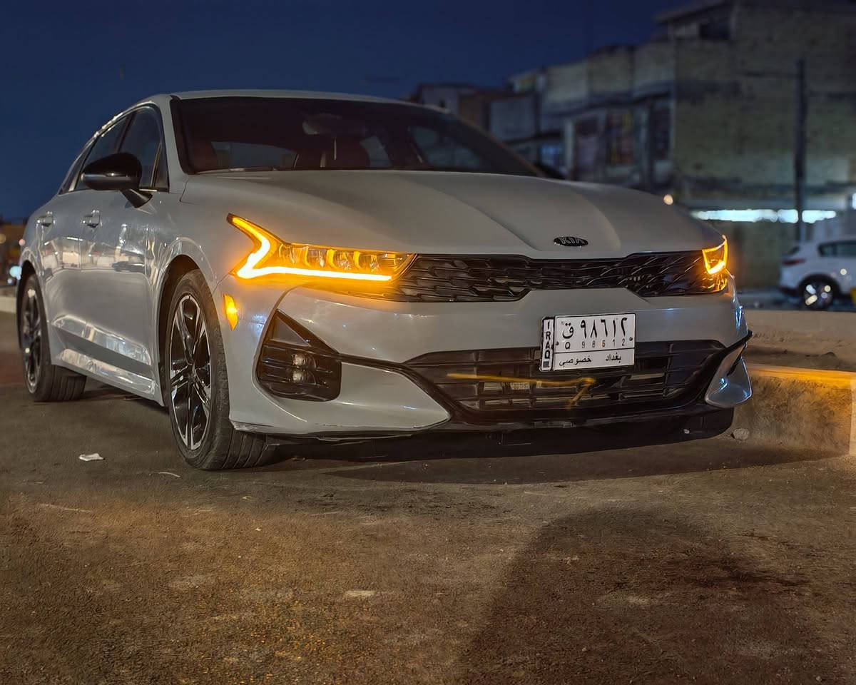 كي فايف K5 GT-Line
فول مواصفات عدا البانورنما 
السعر 158$ وبيه مجال
الحادث : بيه طخه على كد شبر في قاعدة السبير
وبيه كم حالوبه خفيفه مكفولة من الصبغ والتبديل 
كير محرك كفالة ماشية 60 الف ميل حقيقي
صور الحادث وسونر بالمنشور
المواصفات:
• الموديل: 2021
• اللون : اسمنتي
• الفئة: GT-Line فول 
• أوتوماتيك 8 سرعات
• المحرك: 4 سلندر سعة 1.6تيربو
• شاشة لمس كبيرة 
• نظام ملاحة GPS
• نظام صوتي فاخر 
• بلوتوث + تايب سي + أبل كاربلاي 
+ أندرويد أوتو لاسلكي بدون كيبل 
• دخول وتشغيل ذكي (بصمة)
• تشغيل عن بعد
• مقاعد السائق كهرباء
• نظام تكييف مزدوج 
• إضاءة داخلية LED
• نظام اختيار وضعيات القيادة 4 (Eco - Sport - Comfort وغيرها)
• حساسات أمامية وخلفية
• كاميرا خلفية عالية الدقة
• جنوط رياضية مقاس 18 إنش
• أنوار أمامية LED بالكامل
• أنوار نهارية DRL
• أنوار خلفية لد متصلة 
• مرايا كهربائية مع إشارات مع 
• زوائد رياضية GT-Line
• نظام تنيبه السائق 
• حساسات مطر وتحكم أوتوماتيكي بالمساحات
• نظام إضاءة أمامية اوتماتيك
• نظام مانع انغلاق المكابح (ABS)
• نظام الثبات الإلكتروني (ESP)
• نظام المساعدة في صعود المرتفعات
• نظام مراقبة ضغط الإطارات (TPMS)
• نظام تحذير التصادم الأمامي
• نظام الكبح التلقائي في الطوارئ (توقف ذاتي) 
• نظام القياده الشبه ذاتيه
• نظام الحفاظ على المسافه الامنه
• نظام التنبيه عند الخروج عن المسار
• نظام المحافظة على المسار
• نظام مراقبة النقطة العمياء
• فرامل يد كهربائية مع Auto Hold
. كشنات جلد مع ختم GT
والكثير من المواصفات
موقع السيارة بغداد مدينة الصدر 
***********
