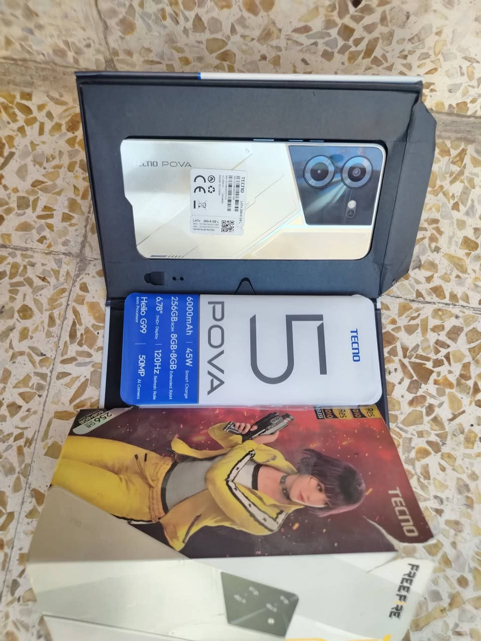 جهاز تكنو بوڤو 5 برو  مراوس فقط فقط مراوسسس
Tecno Pova 5 Pro:

✅ الشاشة: 6.78 إنج FHD+ بدقة 2460×1080

✅ معدل تحديث الشاشة: 120 هرتز

✅ المعالج: MediaTek Dimensity 6080 5G

✅ الذاكرة العشوائية (RAM): 8 جيجابايت

✅ التخزين الداخلي: 256 جيجابايت

✅ الكاميرا الخلفية: 50 ميجابكسل + عدسة مساعدة

✅ الكاميرا الأمامية: 16 ميجابكسل مع فلاش أمامي

✅ البطارية: 6000 ملي أمبير

✅ الشحن السريع: 45 واط Ultra Charge

✅ نظام التشغيل: Android 14 مع واجهة HiOS (قابل للتحديث حسب المنطقة) 

✅ يدعم شبكات 5G

✅ يدعم NFC

✅ يدعم البصمة الجانبية

✅ يدعم السماعات الستيريو

✅ منفذ سماعات 3.5 ملم

✅ يدعم OTG وWi-Fi وBluetooth وGPS 

✅ الألوان: Dark Illusion و Silver Fantasy

✅ الوزن: حوالي 220 غرام 
مراوس ويه ريلمي 11 او 12 او 13 او جهاز مضبوط وشكد فرق اني انطي المهم جهاز مضبوط


**إذا كنت صاحب هذا الإعلان وتريد حذفه لأي سبب، رجاءا أرسل رسالة إلى الدعم الفني**