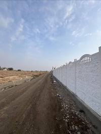 نص دونم للبيع او مراوس بسياره بغداد الرضوانية معمل زينب شارع رابع مجمع...