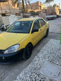 لانسر موديل 2010 ب اسمي تحويل ثاني يوم  رقم انكليزي هزة جديدة مكينه وك...