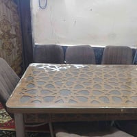 ميز طعام • ٦ كراسي • بضرر