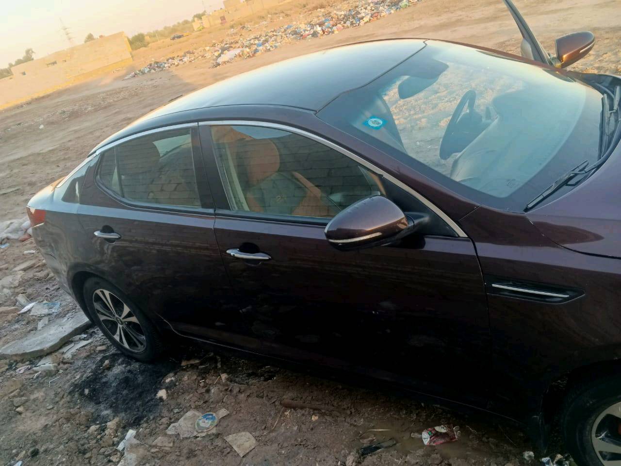 سياره كيه وبتيمه مديل 12 امريكي. محرك جي دي اي 2400 كير 6 نمر سياره حادثه بمريكي بنيد جاملق ايمن  وخشم شاصي مسحوب عل بارد لا عيب شرعي لا شي   مصلحه في عراق سياره رقم بابل بسمي رقم دولي. 