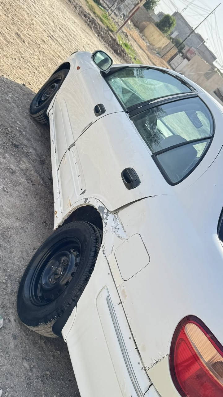 سلام عليكم نيسان سني 2001 رقم بغداد  كير وتو كير  بلادي ما محور  تخم تاير جديد مكان بغداد سعر 55 وبيها مجال تصال ***********
