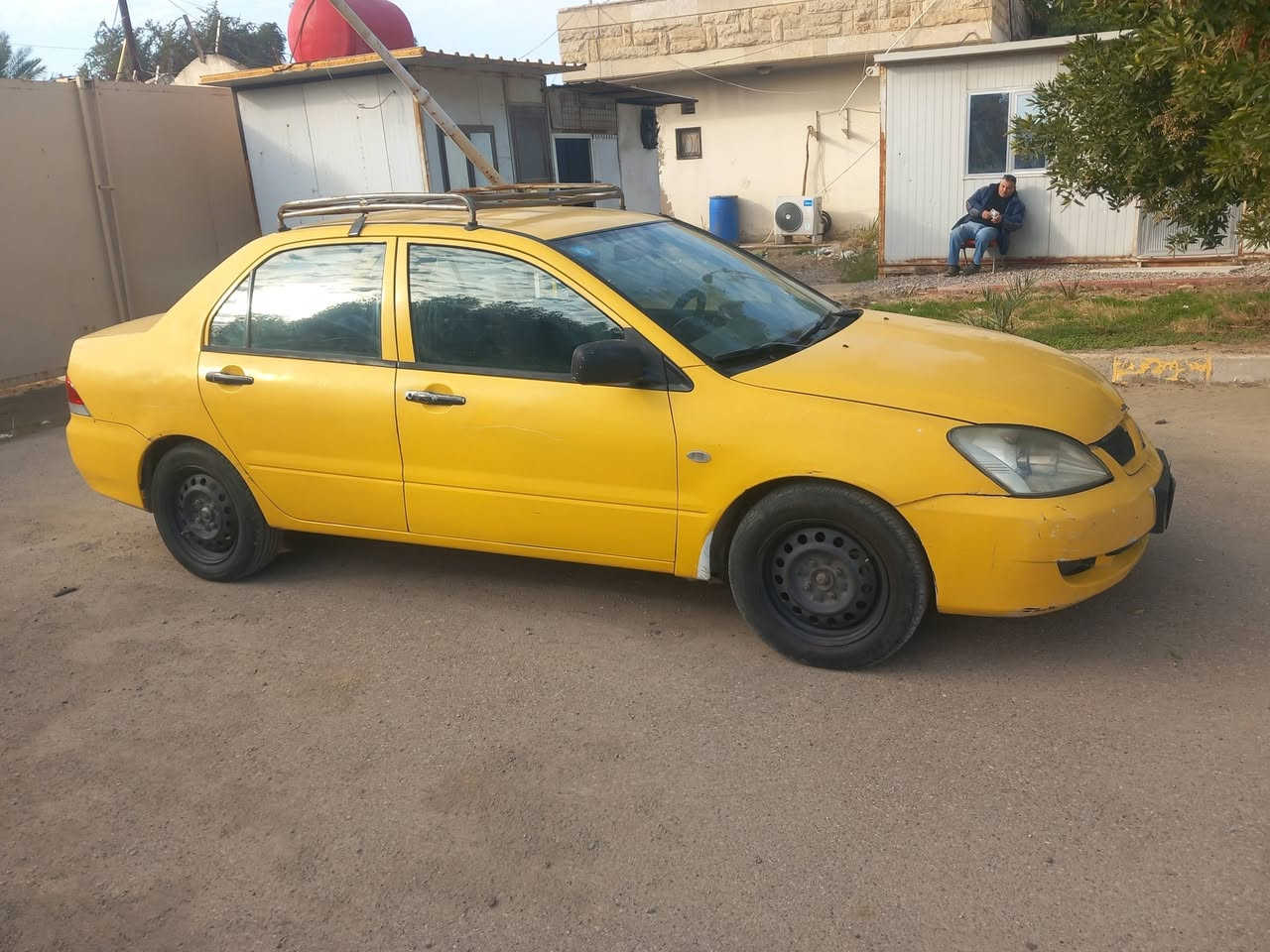 السلام عليكم 
لانسر ٢٠٠٩ 
السياره بسمي ثاني يوم تحويل 
كير اوتو  
سيار خير من الله 
تبريد شغال  تخم تاير جواه 
باتري جديد
بيه ملاحظات 
سعر ٥٥ وبيه مجال بسيط 
للتواصل هذا رقمي 
***********
