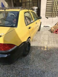 سياره لانسر للبيع موديل 2010 سياره تخم تاير جديد دوشمه شاشه كامره مكين...