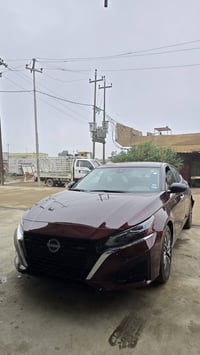 نيسان التيما ٢٠٢٤ ضرر جاملغ خلفي وجنطه وشوية من الباب  بدون رقم حرة تت...