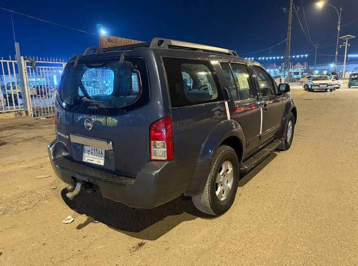 نيسان بافندر موديل 2007 رقم بغداد سنويه جديده مشروع وطني سياره وارد امريكي حادثها باب سايق معمر وبيه البنيد جارد وصبغته لباقي كفاله سياره جاهزه كير مكينه حداديه تخم تاير غاز بانزين سبعه راكب سياره مال جناي سعر 82 وبيها مجال بسيط *********** المجر الكعبي, ميسان
