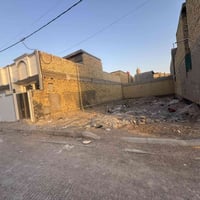 قطعه ١٠٠للبيع موقتها حي الجامعه ثالث فرع بشارع المدارس 07819140114