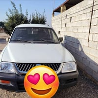 ميتسوبيشي • 2002 • مكينة كارتون