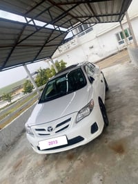 كرولا أمريكي رقم اربيل موديل 2013 فول مواصفات  بصمه سلايت رقم سنويه هز...