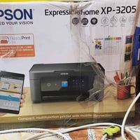 طابعه EPSON 3205 شغاله وجديده بس نقص قطعه وحده كاترج الاسود مااجه وياه...