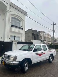 نيسان بيكاب • ٢٠٠٢ • قير ومكينة