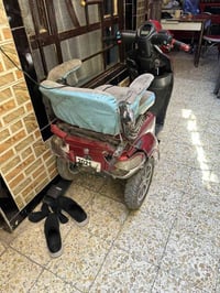 دراجه شحن خمسه بطاريه شغاله بدون بطاريات السعر ٢٠٠ بغدادمدينه الصدر٠٧٧...