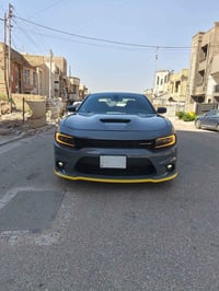 عندي جارجر لون سمنتي مديل 23GTمحرك3600 ماشيه 49سياره نضيفه مابيه اي شي...