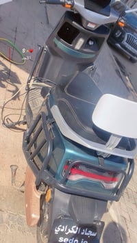 دراجة تيسلا • بطاريات نص عمر • مجال للشراي