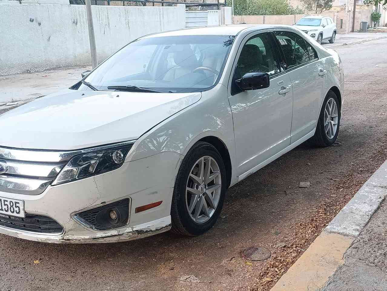 السلام عليكم فورد فيوجن 2012 محرك 2500 وارد امريكي فول مواصفات عدا الفتحة بدون حادث فقط صبغ بابتين اليمين اثر شخط رقم بغداد بسمي سيارة جاهزة ونظيفة جدآ مكانها بغداد حي الزهور سعرها 69 وبيها مجال ***********
