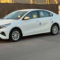البيع سيراتو موديل  2024 مكينه2000حساس خلفي داخل ابيض رقم بغداد بسمي م...
