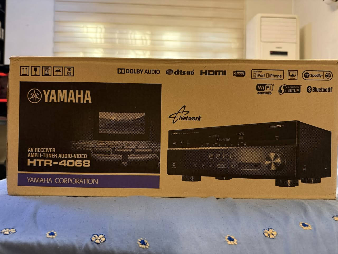 Yamaha HTR-4068 AV Receiver – 
جهاز جدييييد بال باكيت وحديث   غير مستعمل 
كامل  كل ملحقاته ويا المايك والانتنا  والريموت 
المواصفات 
السعر المطلوب ٣٠٠$
النظام:
 • 5.1 قناة حقيقية
يدعم  spotify +air play 
يحتوي على wifi + bluetooth 
القدرة الصوتية:
 • 100 واط لكل قناة
 • يدعم سماعات 6–8 أوم

الصيغ الصوتية المدعومة:
 • Dolby Digital
 • Dolby Digital Plus
  •        Dolby Digital HD
 • DTS HD
 • PCM متعدد القنوات عبر HDMI / ARC

المعايرة الصوتية:
 • نظام YPAO للمعايرة الأوتوماتيكية مع مايكروفون

الاتصالات:
 • HDMI مع دعم ARC
 • Optical (مدخل بصري)
 • Coaxial
 • RCA (Analog)

الفديو  
4K HDR+

مخارج الصوت:
 • مخرج Subwoofer نشط (Active Sub)

خصائص إضافية:
 • وضع Cinema DSP من ياماها
 • تحكم كامل بالريموت
 • وضع ECO لتقليل استهلاك الطاقة


**إذا كنت صاحب هذا الإعلان وتريد حذفه لأي سبب، رجاءا أرسل رسالة إلى الدعم الفني**