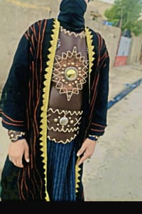 ازياء تشابيه • عباية مطرزة • درع جلد