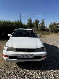 كورولا • ابيض • رقم نينوى