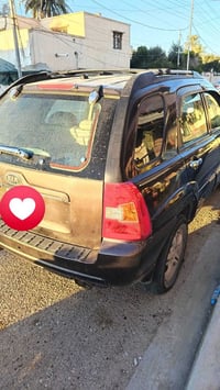 سبورتج 2008 رقم شمالي  مصبوغه حزام جماليه بدون قماره محرك 2700   محرك ...